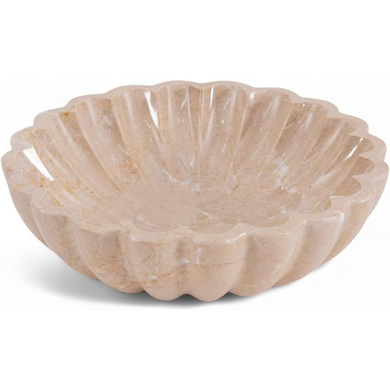 Decorative beige shell-shaped bowl on a white background