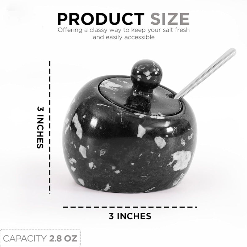 Black marble salt shaker with spoon on a white background, showing product size and capacity.