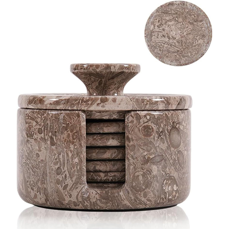 Marble-patterned container with coasters on a white background