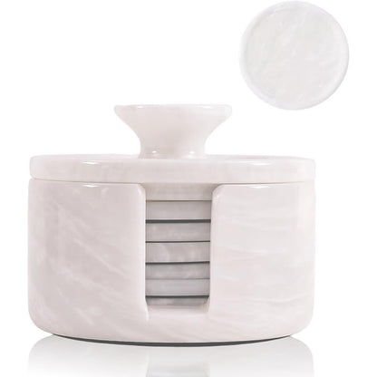 White marble-patterned container with lid on a white background