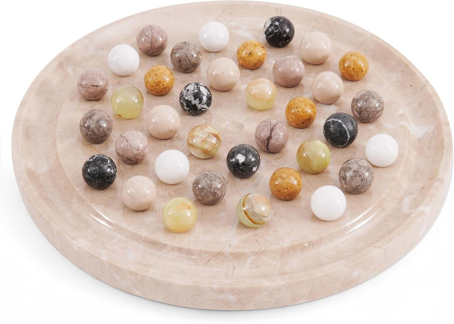Marble-patterned platter with assorted marbles on a white background